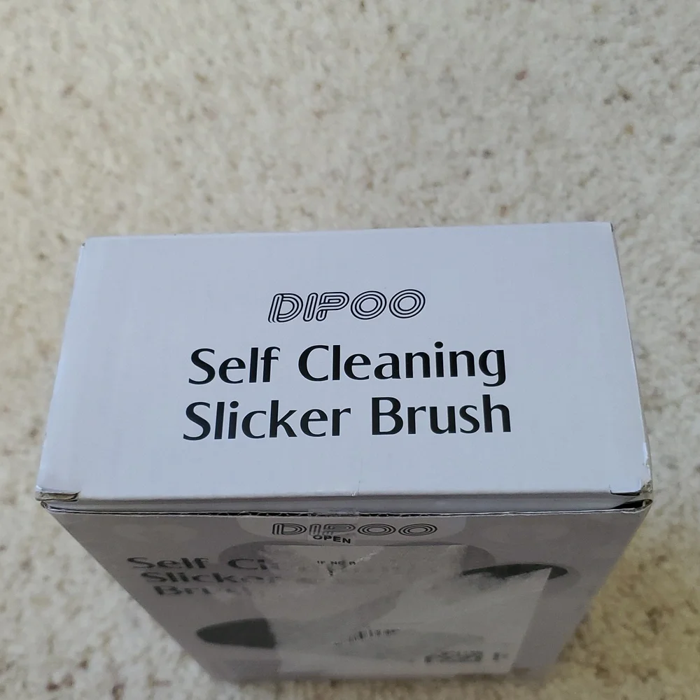 White and Black Dog Grooming Brush